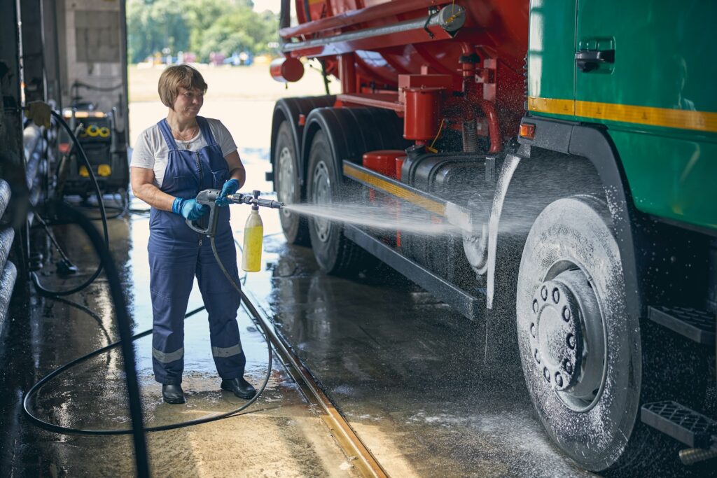 woman cleaning a truck